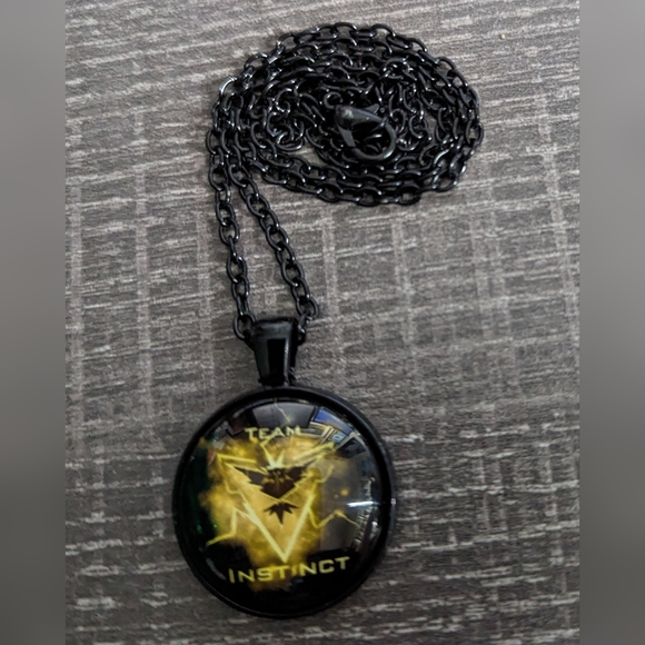 Pokemon Team Instinct Necklace, NWOT - Picture 3 of 3